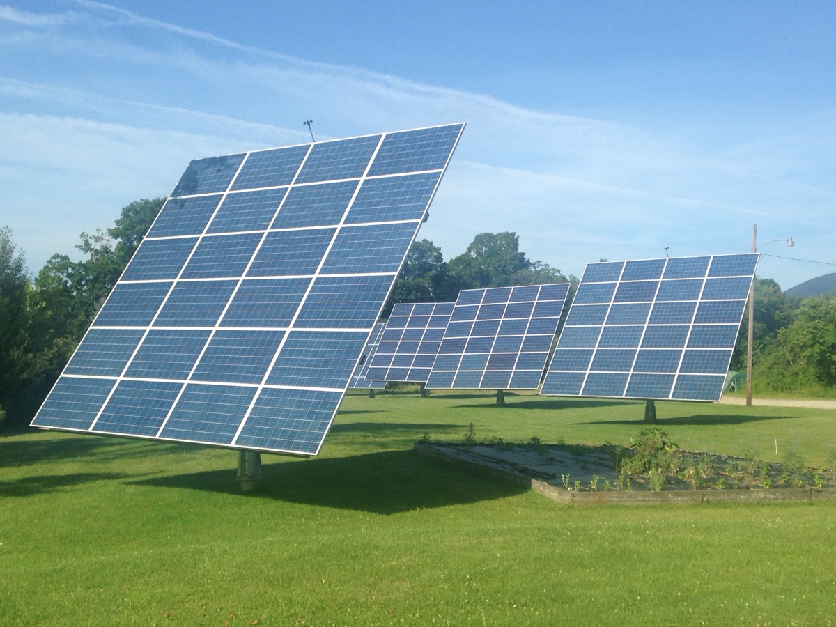 Generic ground-mounted solar PV panel array — industry example photo